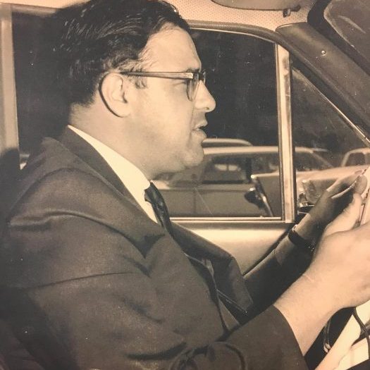 Micky Adler driving to demo his innovative solutions to customers in the 1950s